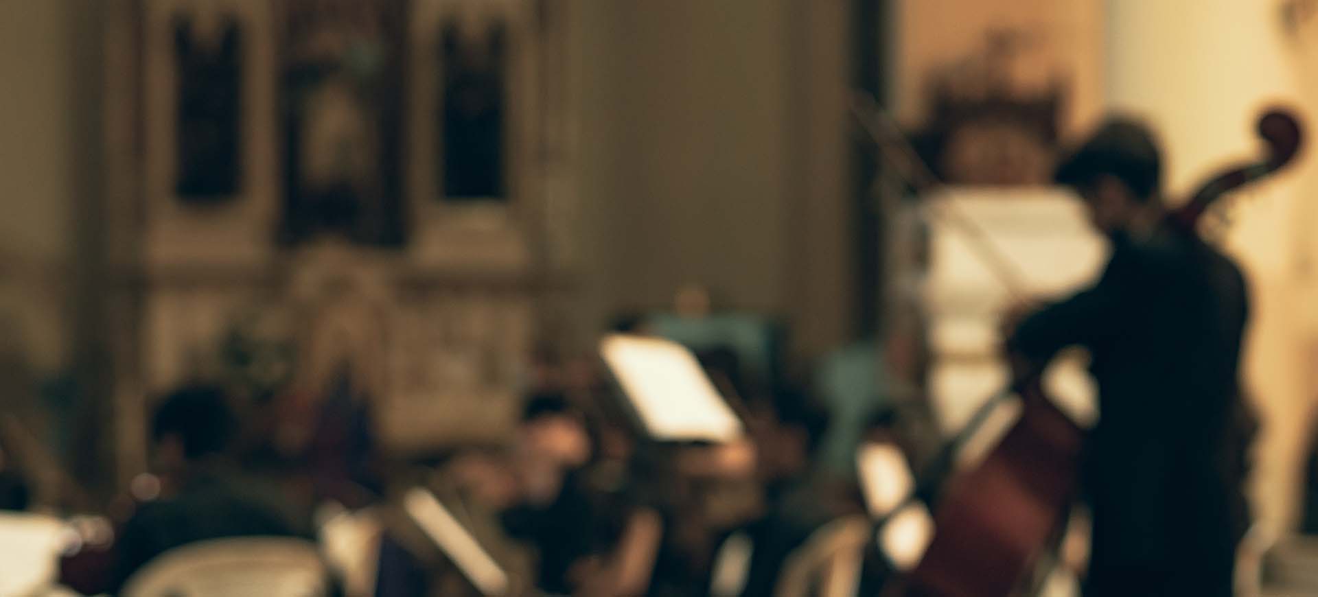 Image Of An Out Of Focus Orchestra From A Theater Balcony